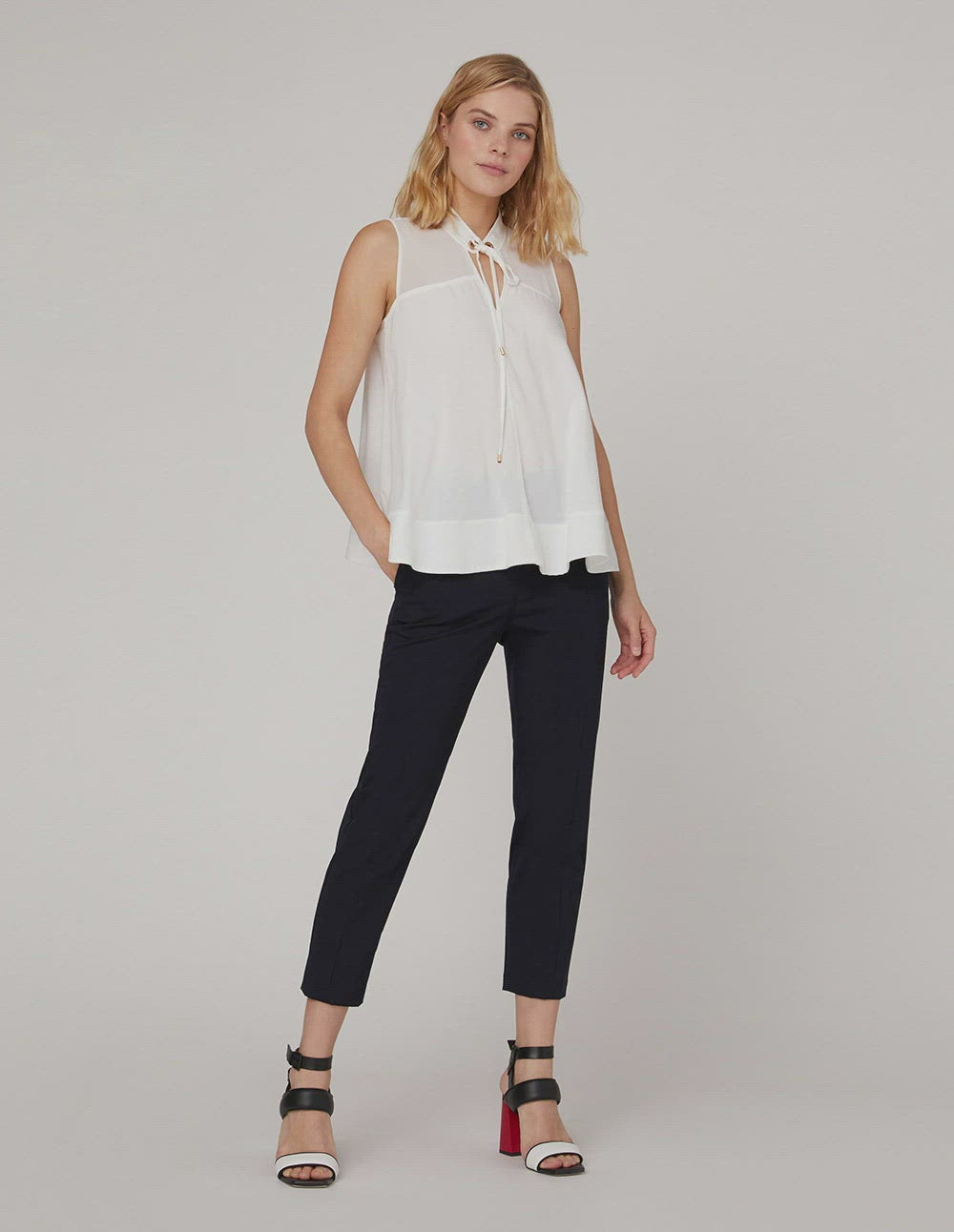 MARYLING White neckline sleeveless loose A-shaped hem top